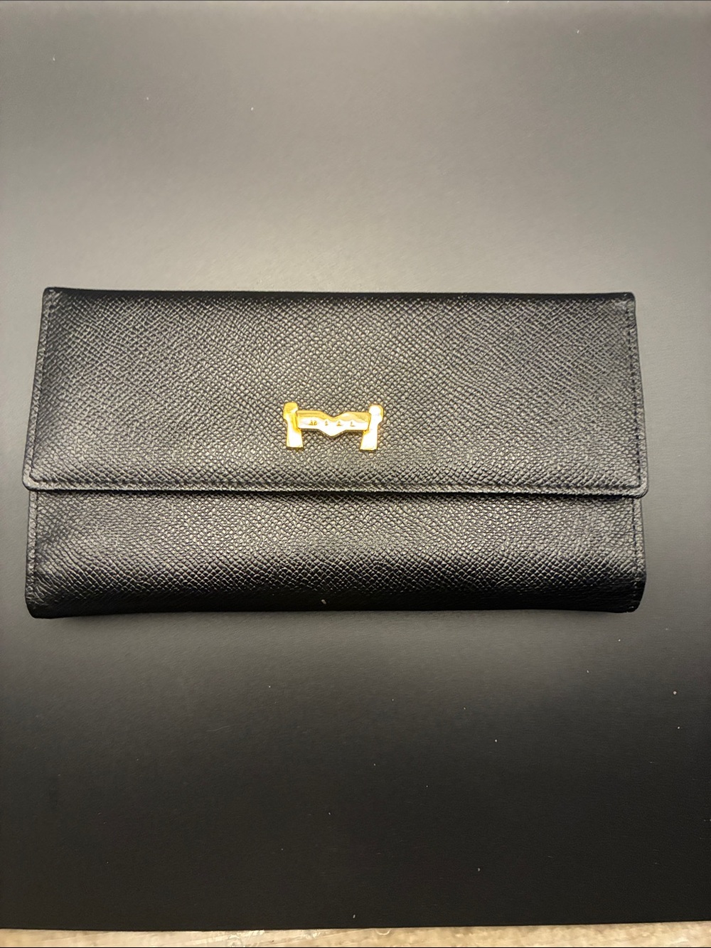Elegant Black Continental Wallet with Gold Hardware